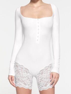 Skims fits everybody white snow lace long sleeve onesie